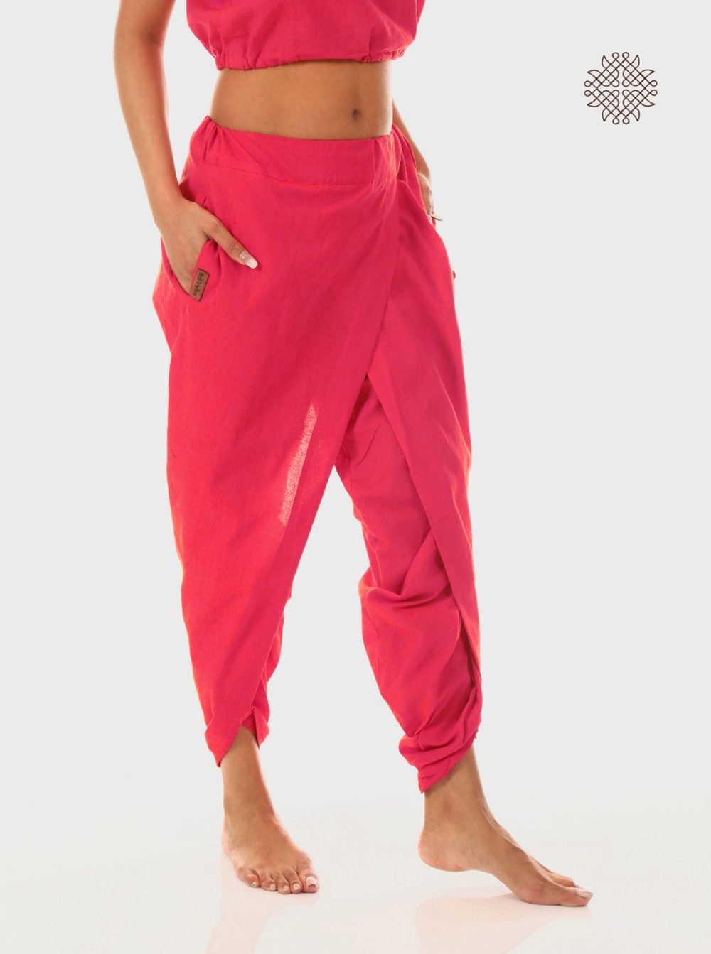pAtala (coral pink) taruNi, cross-cut dhoti pants with pockets  crafted in 100% cotton