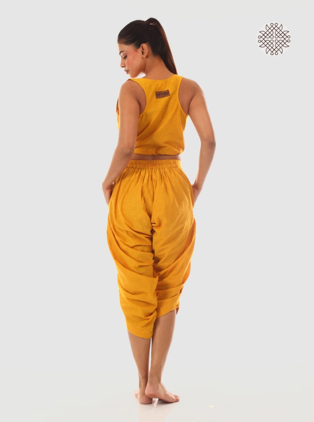 haridra (mustard yellow) taruNi, cross-cut calf length dhoti pants with pockets crafted in 100% cotton - Image 4