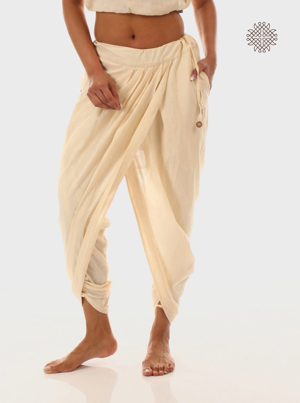 sattvika (off-white) yuvaki, pleated dhoti pants with pockets crafted in 100% cotton
