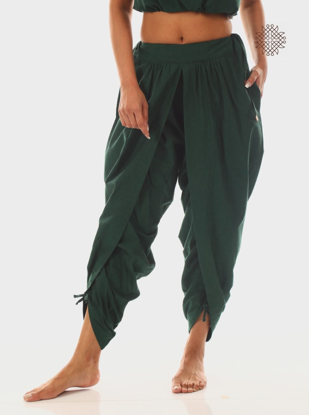 sattvika (off-white) yuvaki, pleated dhoti pants form a comfy wrap crafted in 100% cotton