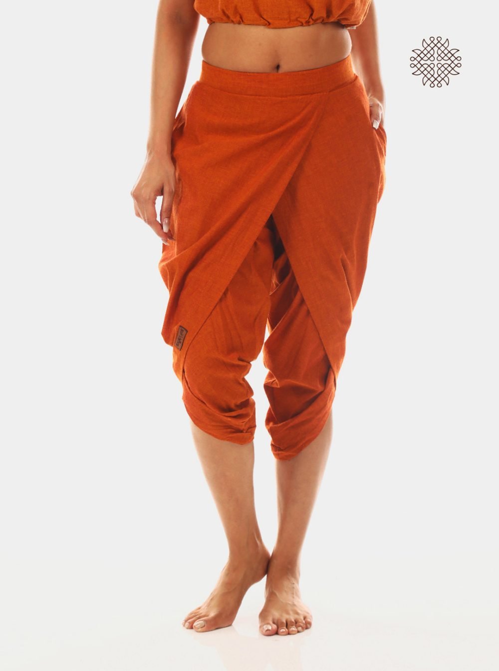 kapila (rusty brown) taruNi, cross-cut calf length dhoti pants with pockets crafted in 100% cotton